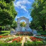 Monument to Johann Strauss in the center of a garden in Austria