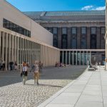 minimalistic graceful colonnade and sunny courtyard James Simon